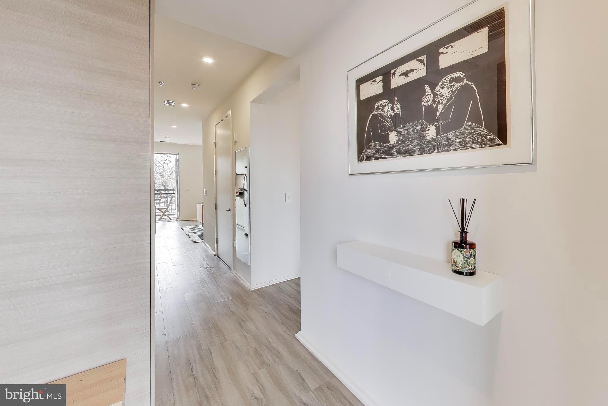 1550 11th Street Northwest, Unit 203 Washington, DC 20005 - Photo 9 of 35 Modern entryway with artistic flair.