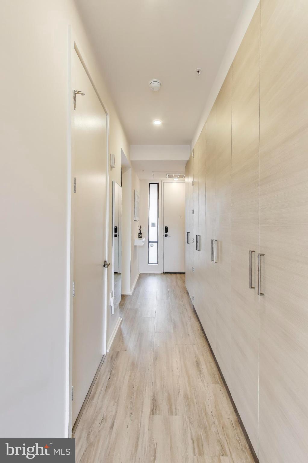 1550 11th Street Northwest, Unit 203 Washington, DC 20005 - Photo 10 of 35 Bright and inviting modern hallway.