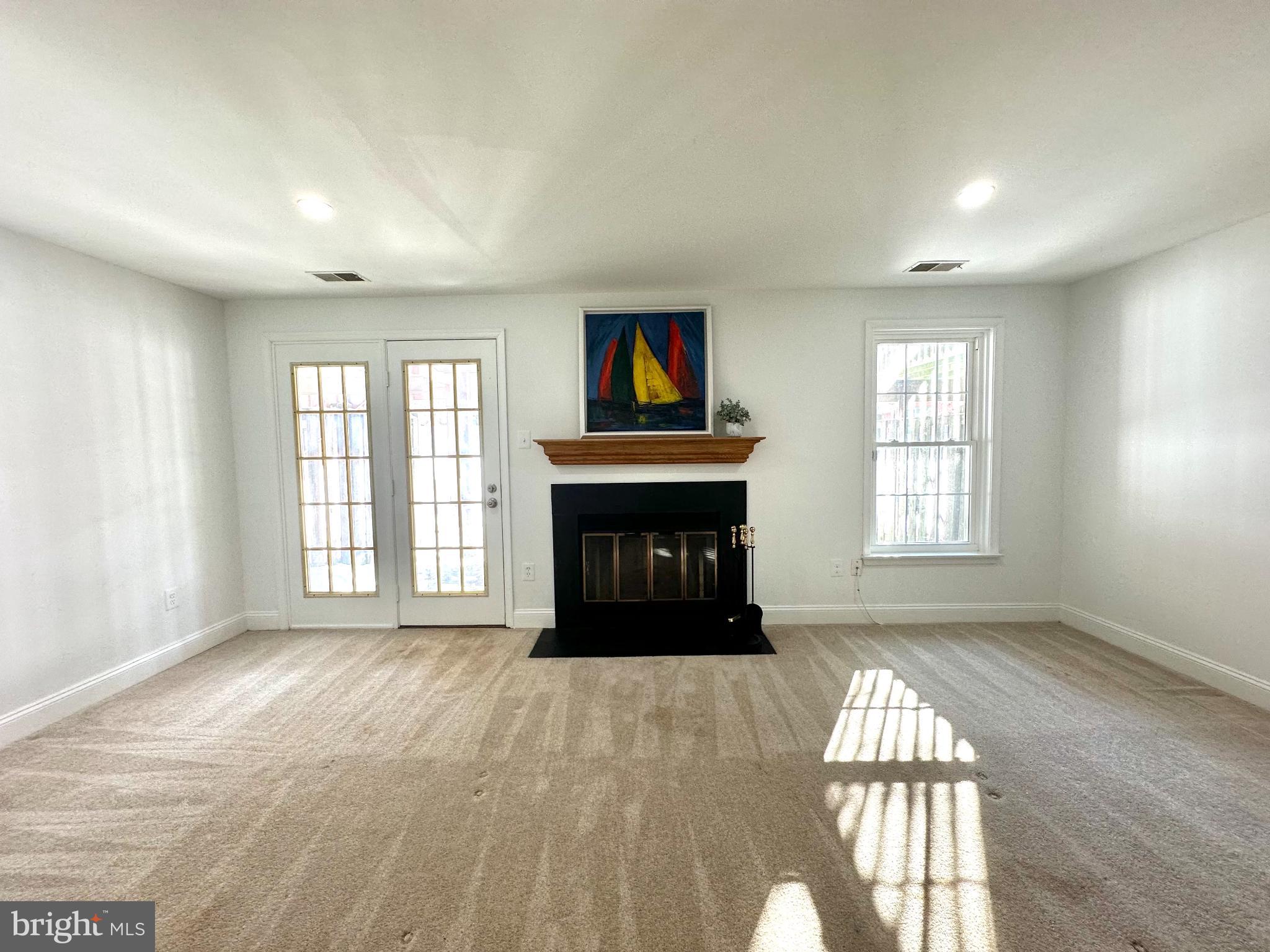 4713 Columbia Road Ellicott City, MD 21042 - Photo 18 of 39 Family room, lower level, walkout.