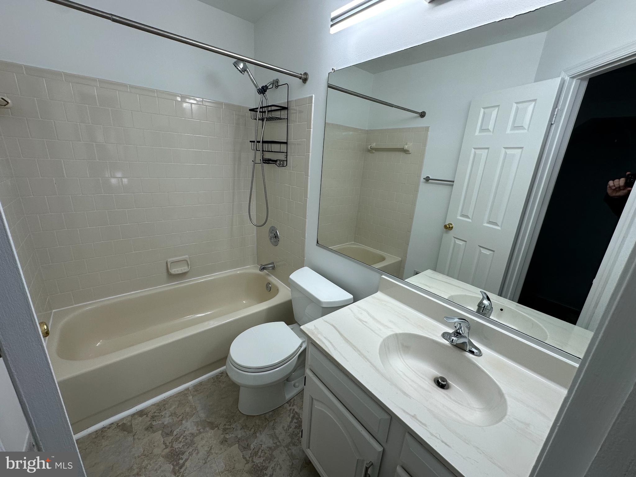 4713 Columbia Road Ellicott City, MD 21042 - Photo 32 of 39 Modern bathroom with clean, neutral tones.
