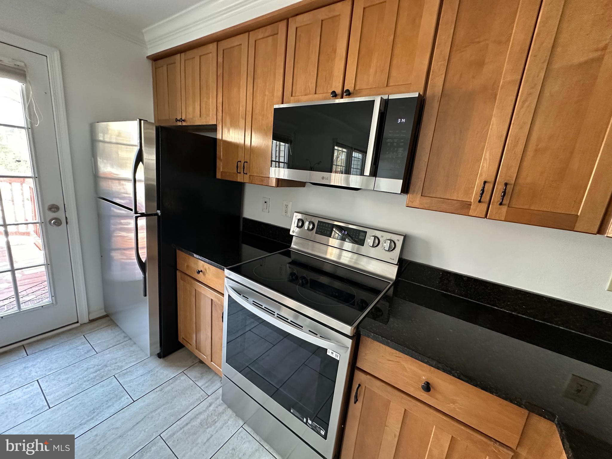 4713 Columbia Road Ellicott City, MD 21042 - Photo 4 of 39 Modern kitchen with sleek finishes.