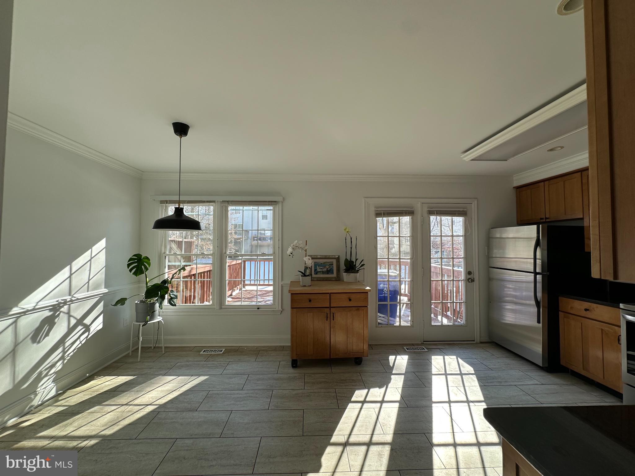 4713 Columbia Road Ellicott City, MD 21042 - Photo 8 of 39 Bright and airy kitchen with natural light.