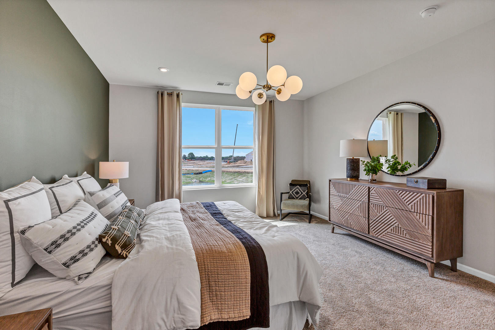 2798 Spring Circle South Lindenhurst, IL 60046 - Photo 13 of 16 a bedroom with a bed and a chandelier