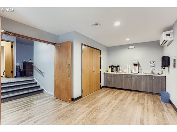 24353 South Ridge Road Beavercreek, OR 97004 - Photo 11 of 33 a view of a room with wooden floor and furniture