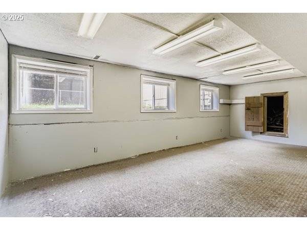24353 South Ridge Road Beavercreek, OR 97004 - Photo 14 of 33 a view of an empty room with a window