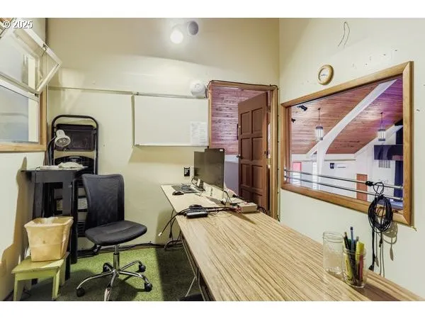 a kitchen with furniture and a stove top oven