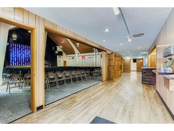24353 South Ridge Road Beavercreek, OR 97004 - Photo 9 of 33 a lobby with furniture and a wooden floor