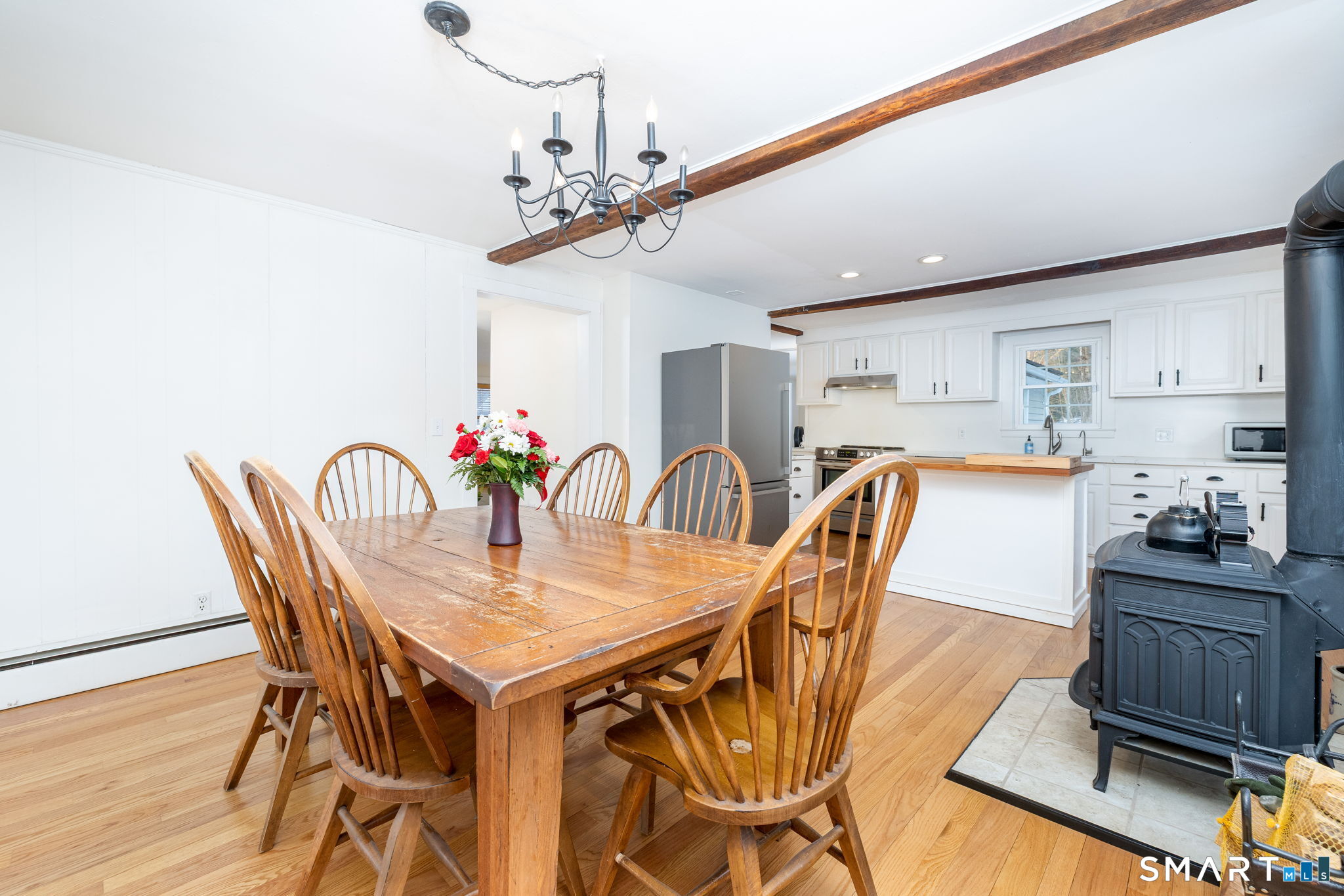 10 Bailey Road Enfield, CT 06082 - Photo 11 of 39 a view of a dining room with furniture and wooden floor