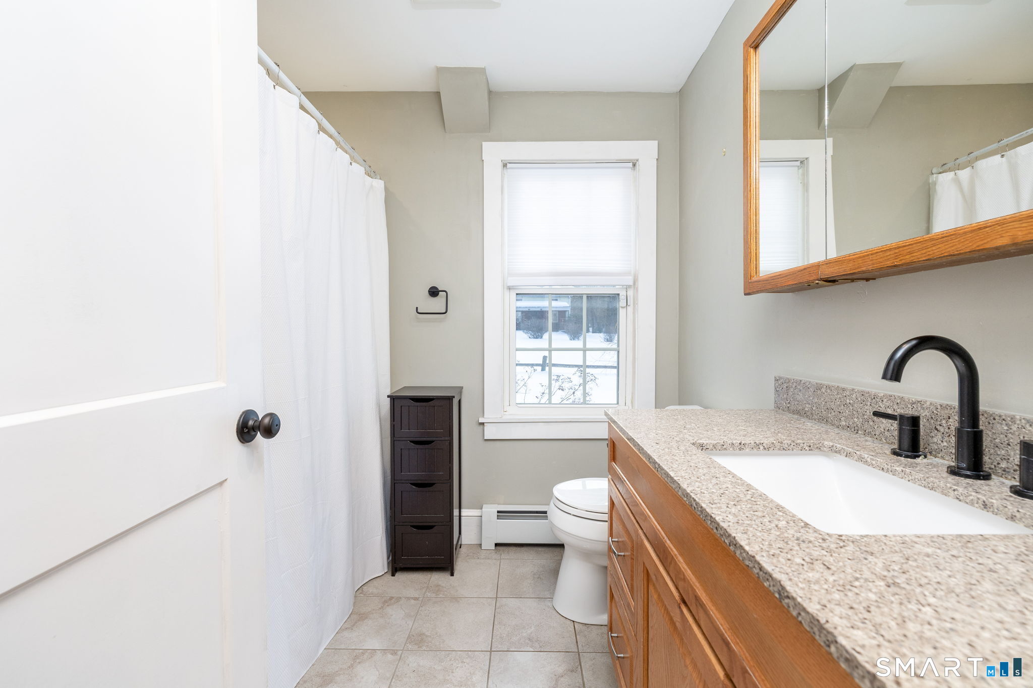 10 Bailey Road Enfield, CT 06082 - Photo 29 of 39 a bathroom with a granite countertop sink a toilet and shower