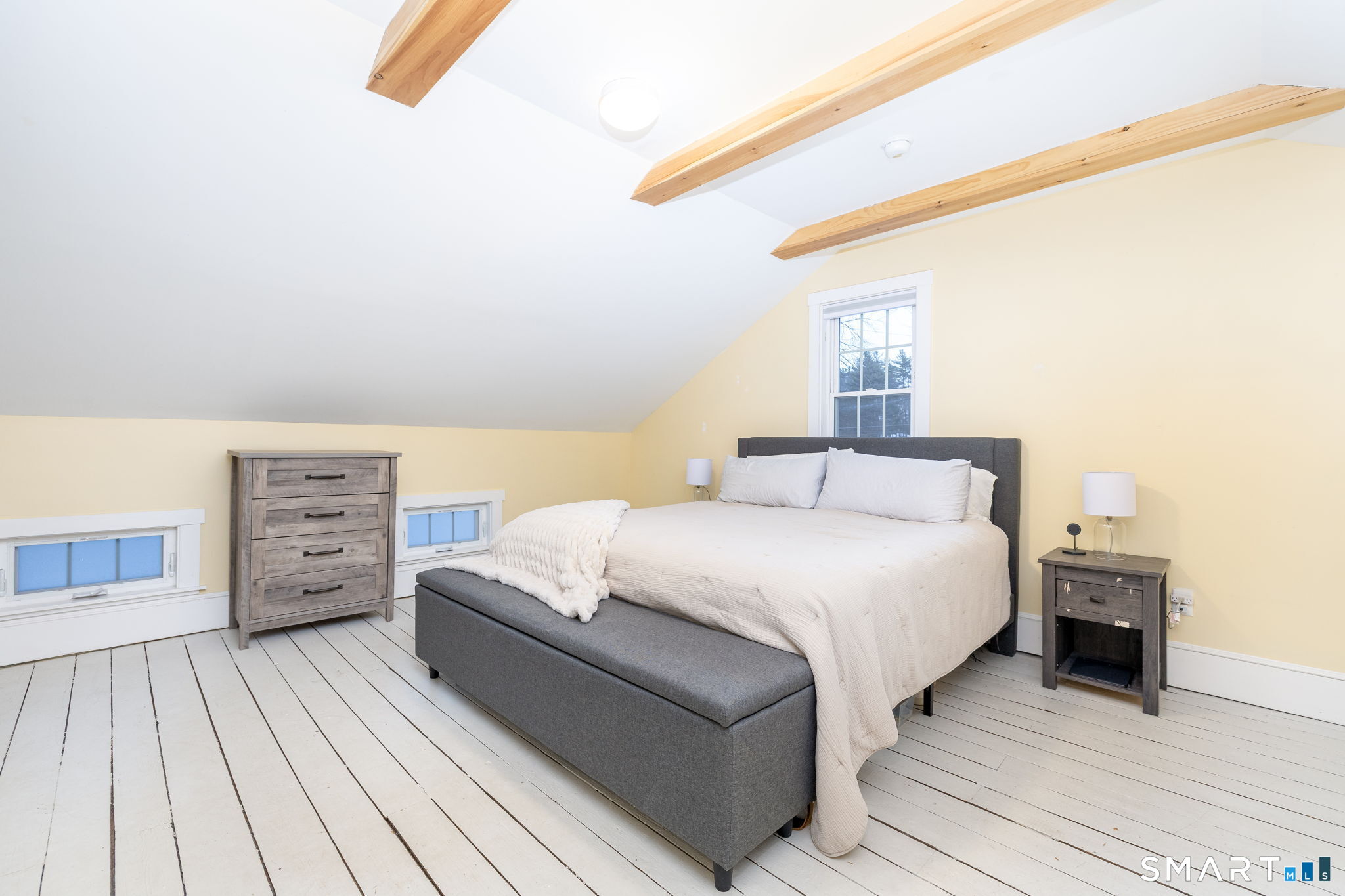 10 Bailey Road Enfield, CT 06082 - Photo 30 of 39 a bedroom with a bed and a couch