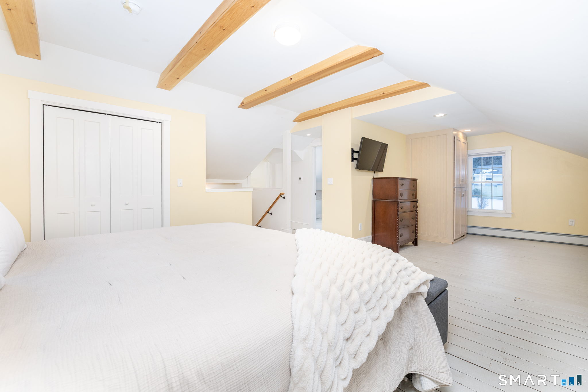 10 Bailey Road Enfield, CT 06082 - Photo 32 of 39 a bedroom with a bed and a dresser