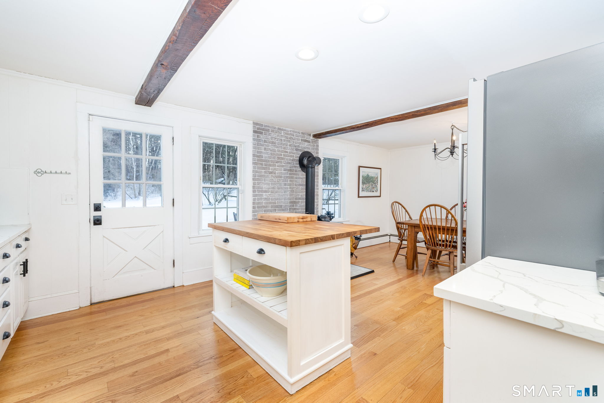 10 Bailey Road Enfield, CT 06082 - Photo 8 of 39 a view of living room with granite countertop furniture and fireplace
