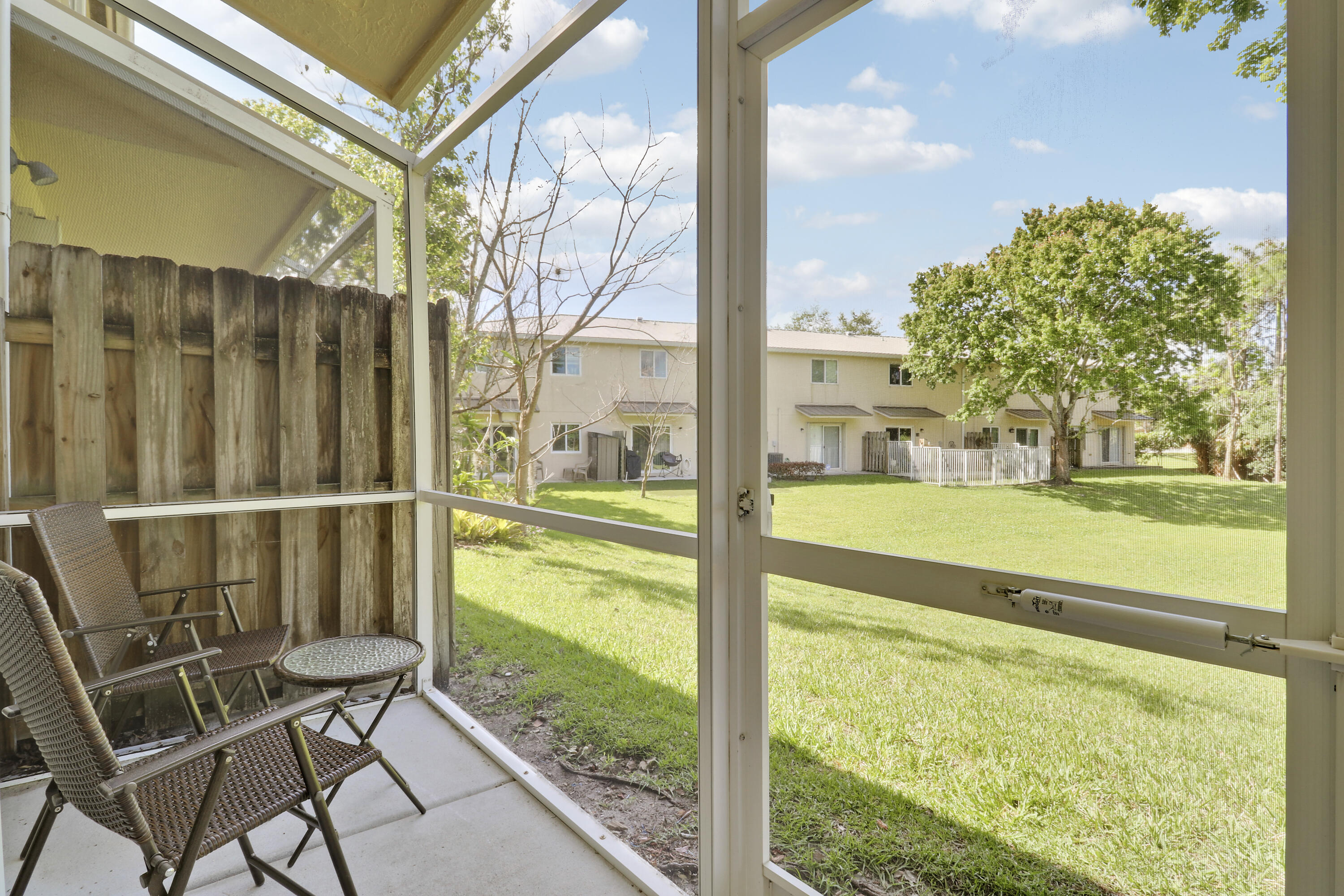 5410 Southeast Mitchell Lane Stuart, FL 34997 - Photo 4 of 24 a view of swimming pool with outdoor seating