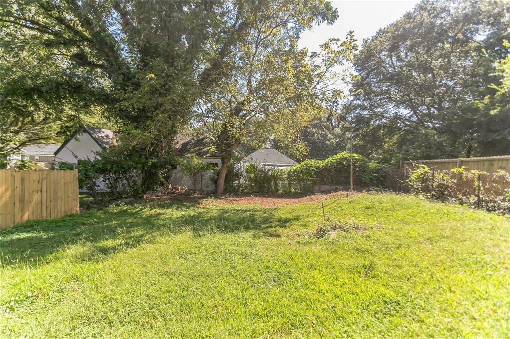 1252 Epworth Street Southwest Atlanta, GA 30310 - Photo 19 of 19 a view of a yard with a tree