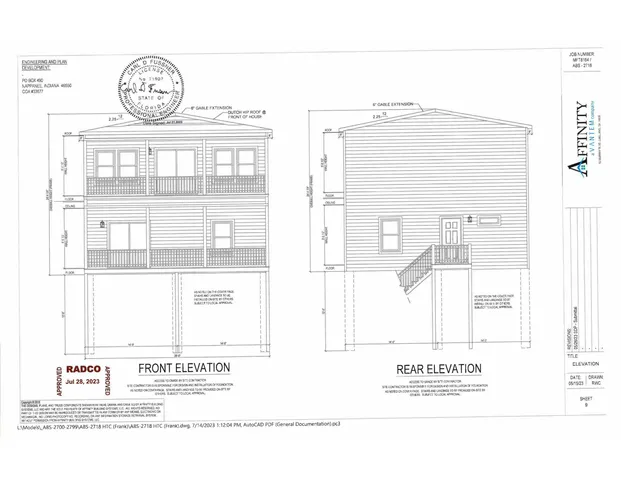 a black and white photo of a living room