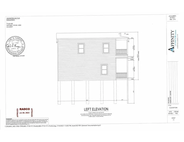 a black and white photo of a living room