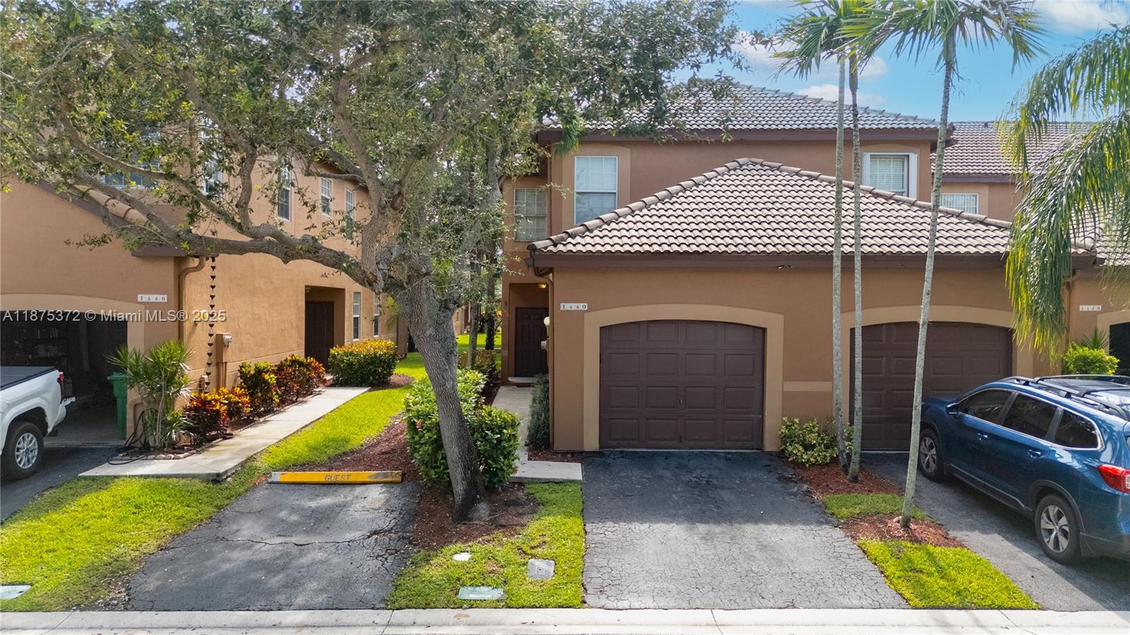 1440 Coronado Road, Unit 138 Weston, FL 33327 - Photo 1 of 38 a view of house with outdoor space and swimming pool