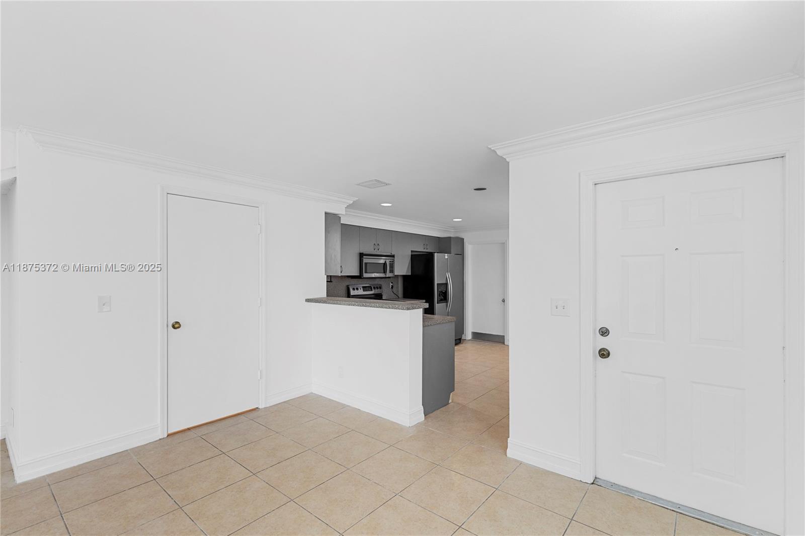 1440 Coronado Road, Unit 138 Weston, FL 33327 - Photo 13 of 38 a view of a kitchen