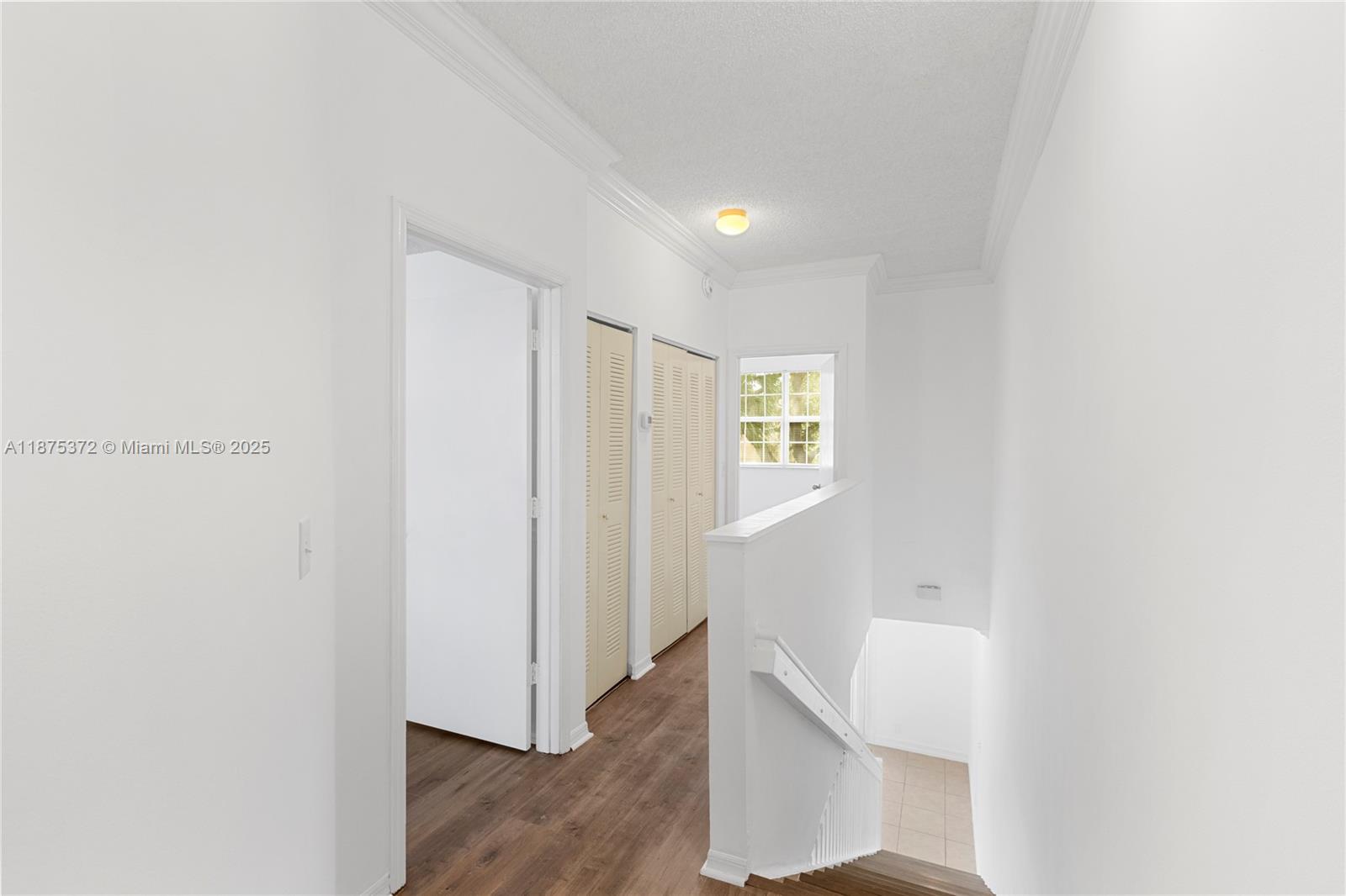 1440 Coronado Road, Unit 138 Weston, FL 33327 - Photo 15 of 38 a view of an entryway with wooden floor