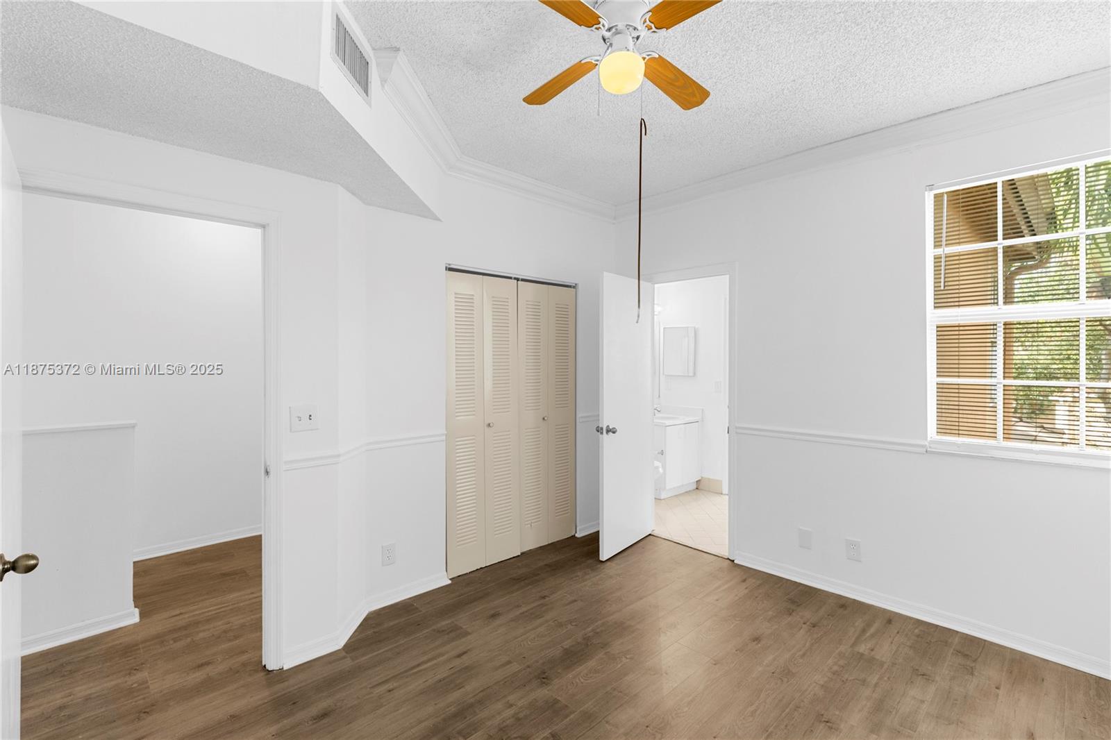 1440 Coronado Road, Unit 138 Weston, FL 33327 - Photo 17 of 38 a view of an empty room with a window