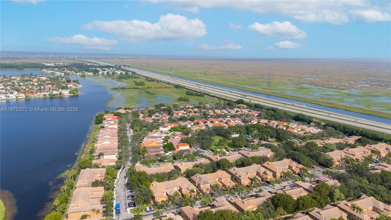 1440 Coronado Road, Unit 138 Weston, FL 33327 - Photo 31 of 38 a view of a city with an ocean