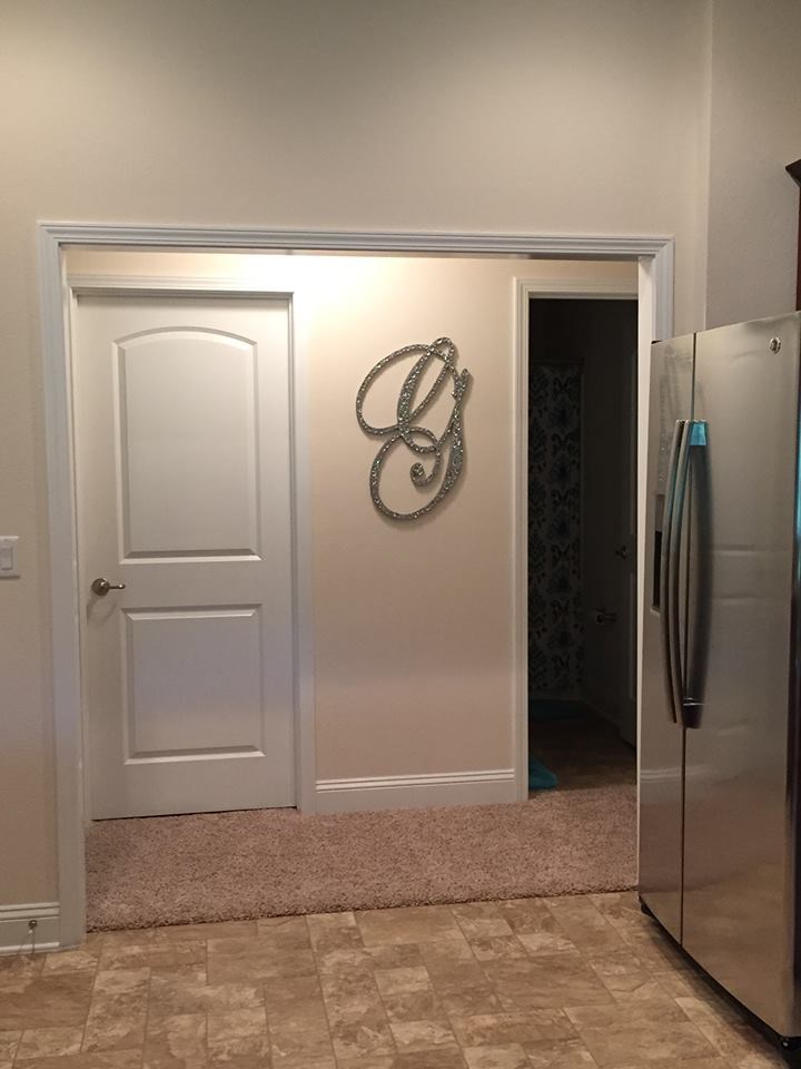 88392 Maybourne Road Yulee, FL 32097 - Photo 5 of 34 a bathroom with a glass shower door and a sink
