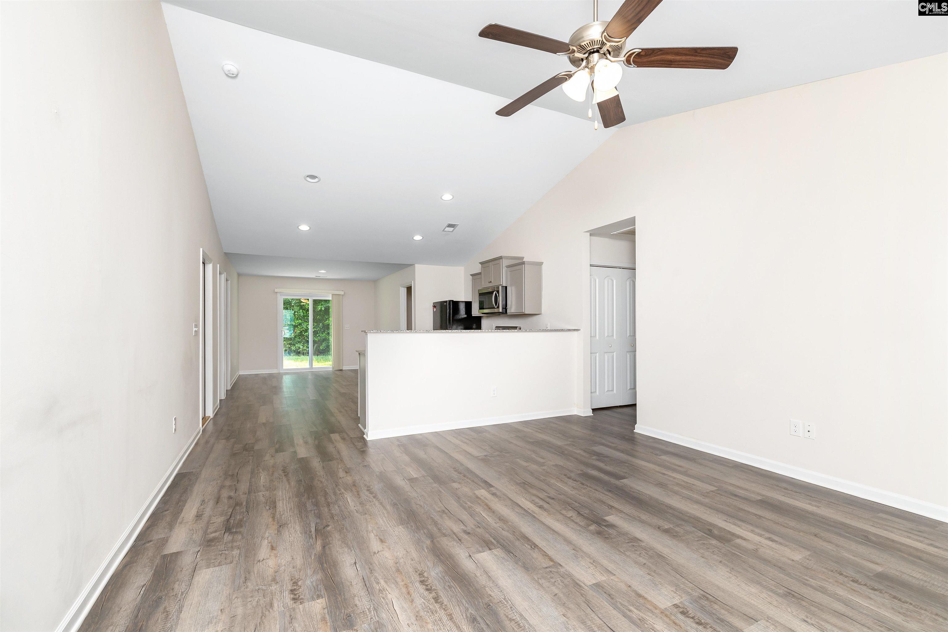 2157 Still Pointe Drive Sumter, SC 29154 - Photo 5 of 25 a view of a kitchen with microwave and cabinets