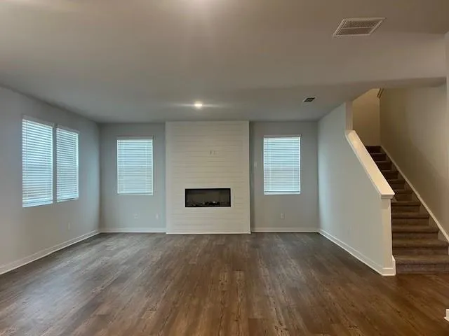 a view of hallway with livingroom
