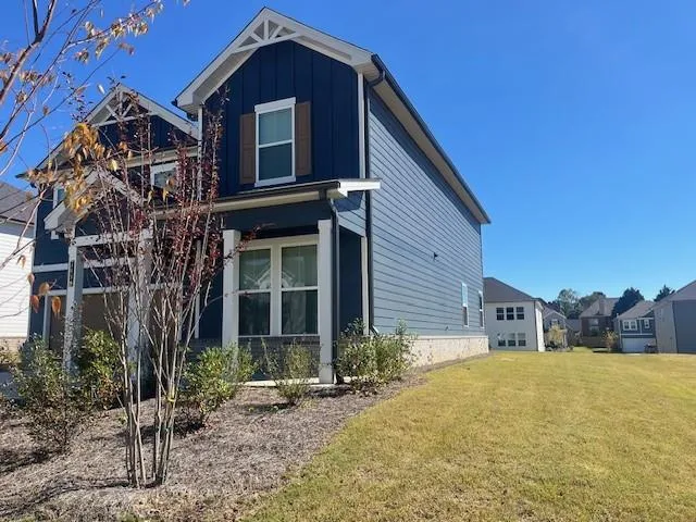 a house view with a outdoor space