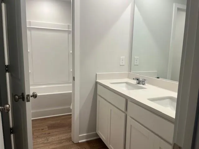 an empty room with a empty space and a window