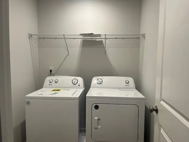 a view of a room that has a window in it