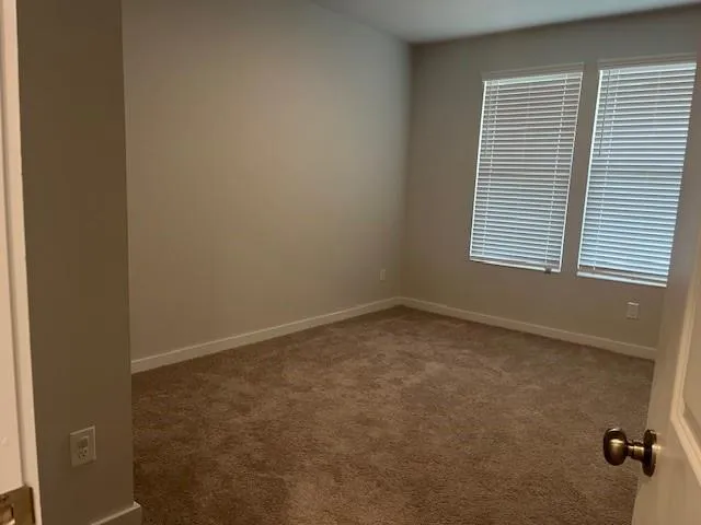 a bathroom with a sink and bathtub with toilet