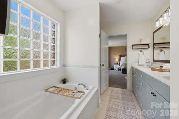 a room with a bed and a window