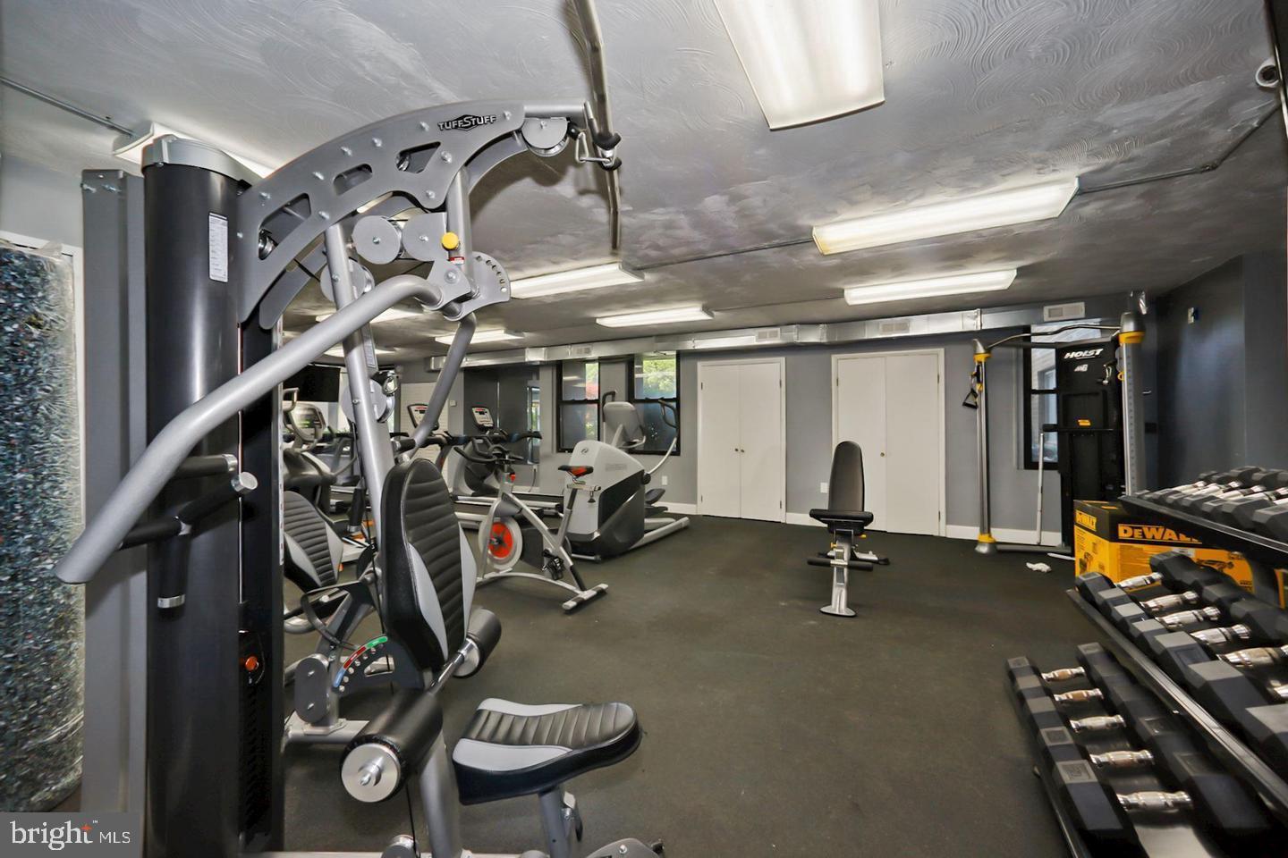 1836 Metzerott Road, Unit 916 Adelphi, MD 20783 - Photo 22 of 29 a view of a room with gym equipment