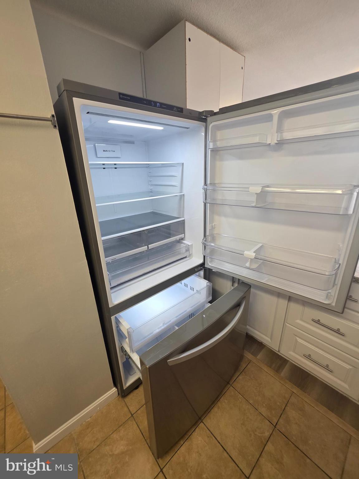 1836 Metzerott Road, Unit 916 Adelphi, MD 20783 - Photo 26 of 42 a room with storage and utility