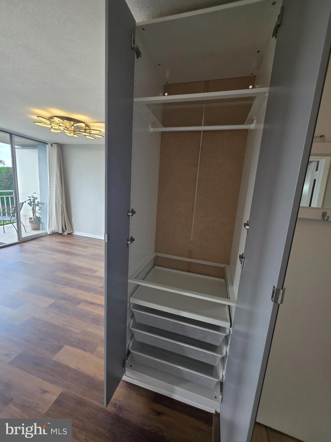 1836 Metzerott Road, Unit 916 Adelphi, MD 20783 - Photo 33 of 42 a view of entryway with wooden floor