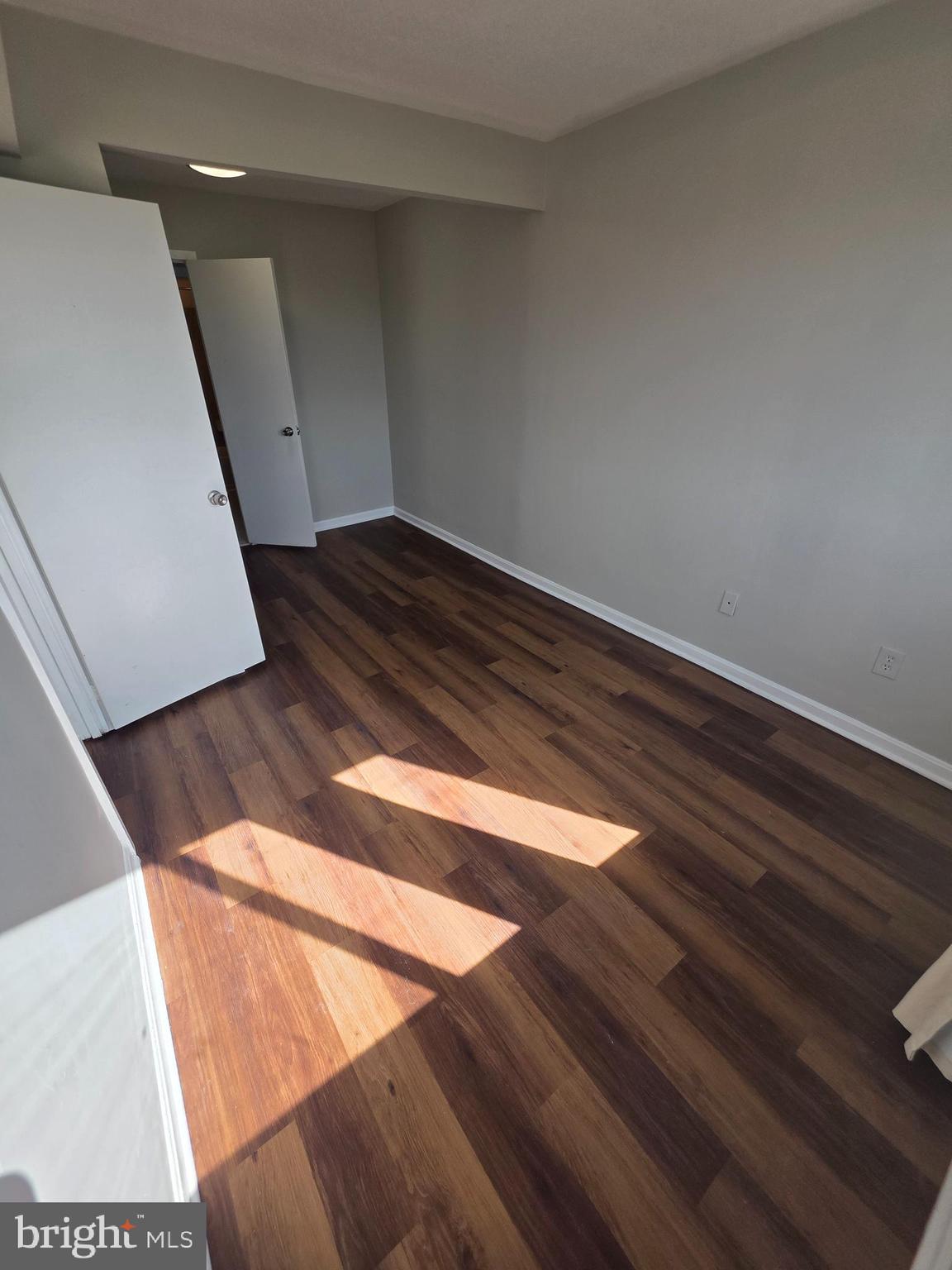 1836 Metzerott Road, Unit 916 Adelphi, MD 20783 - Photo 36 of 42 a view of wooden floor