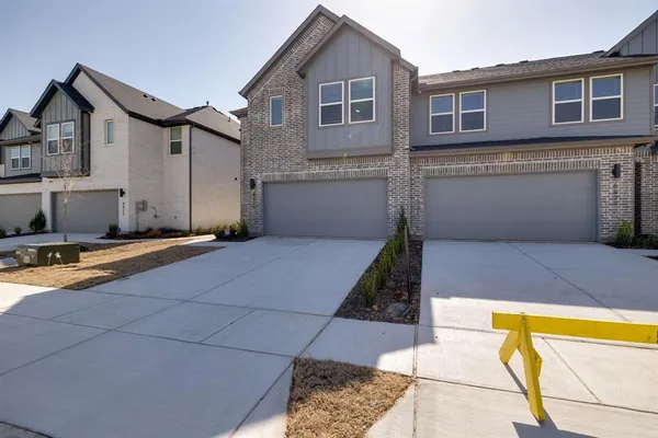a front view of a house with swimming pool
