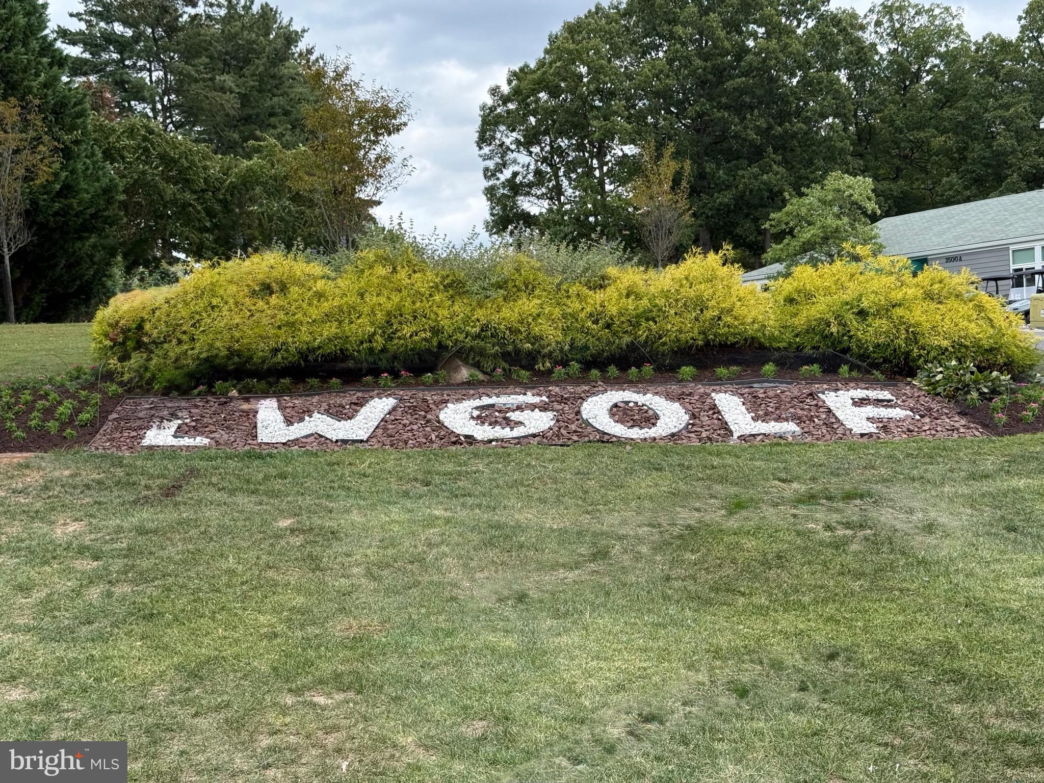 3301 South Leisure World Boulevard, Unit 991H Silver Spring, MD 20906 - Photo 22 of 25 a view of a yard with an outdoor space
