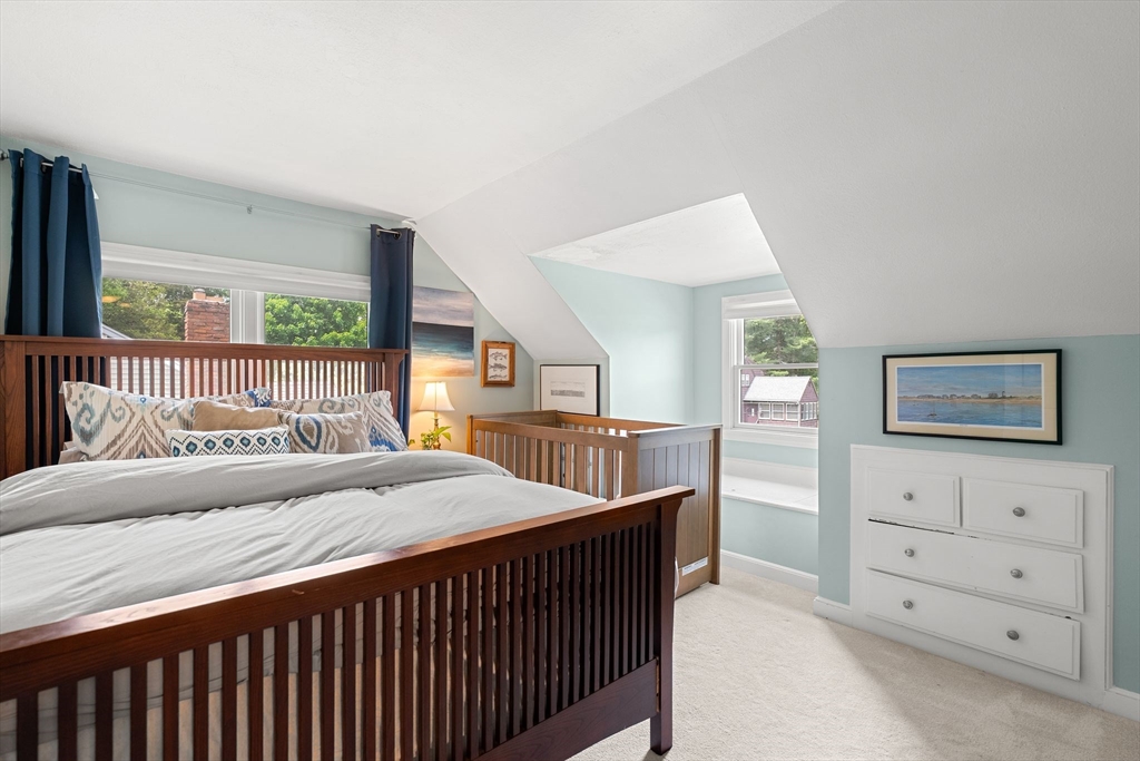 35 Spallus Road Stoughton, MA 02072 - Photo 24 of 39 a bedroom with furniture and a window