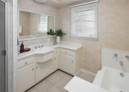 a bathroom with a sink and a bathtub