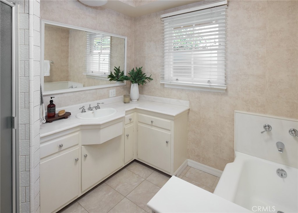 1261 East Maple Avenue El Segundo, CA 90245 - Photo 18 of 26 a bathroom with a sink and a bathtub