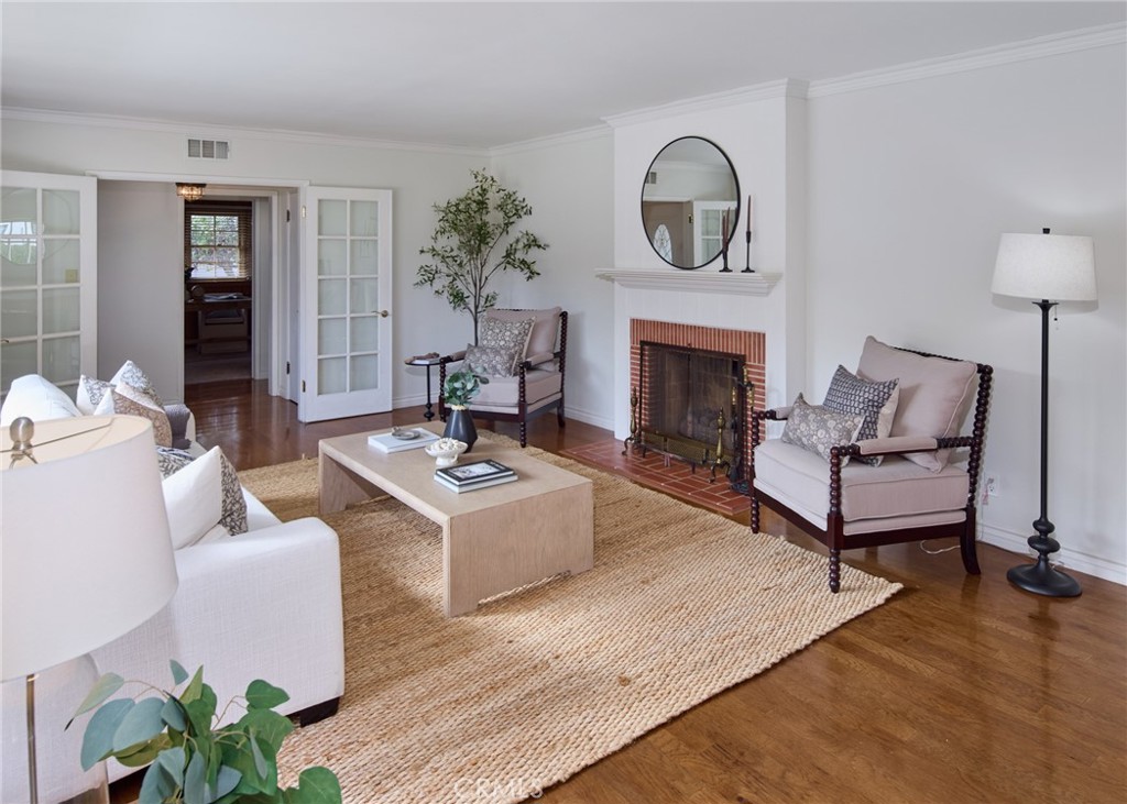 1261 East Maple Avenue El Segundo, CA 90245 - Photo 2 of 26 a living room with furniture and a fireplace