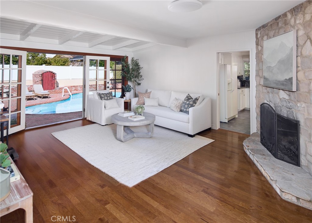 1261 East Maple Avenue El Segundo, CA 90245 - Photo 8 of 26 a living room with furniture and a fireplace