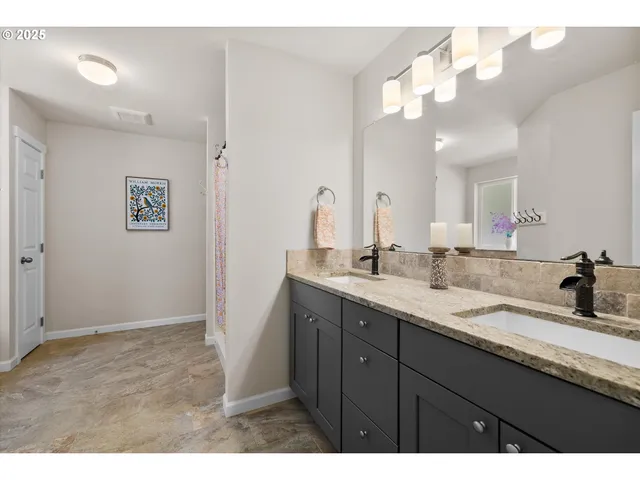 a picture of a living room and bathroom