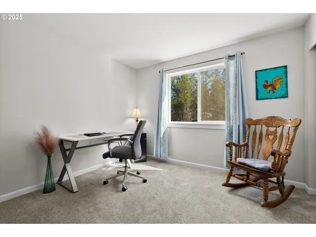 a view of a livingroom with furniture
