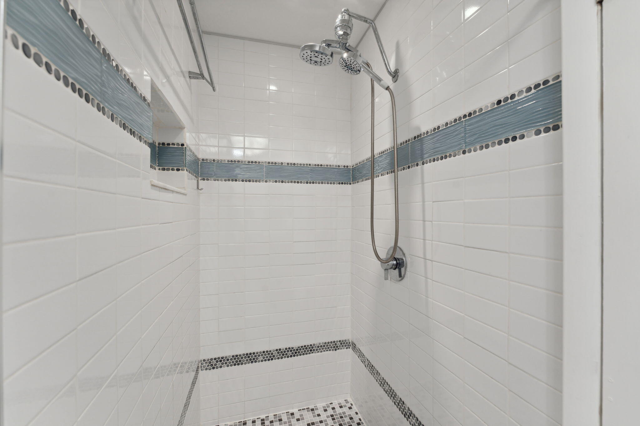 2691 Northeast 18th Street Pompano Beach, FL 33062 - Photo 16 of 34 a bathroom with a shower