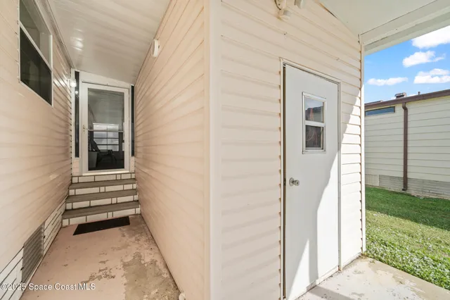 $179,800 | 720 Periwinkle Circle, Barefoot Bay, FL 32976