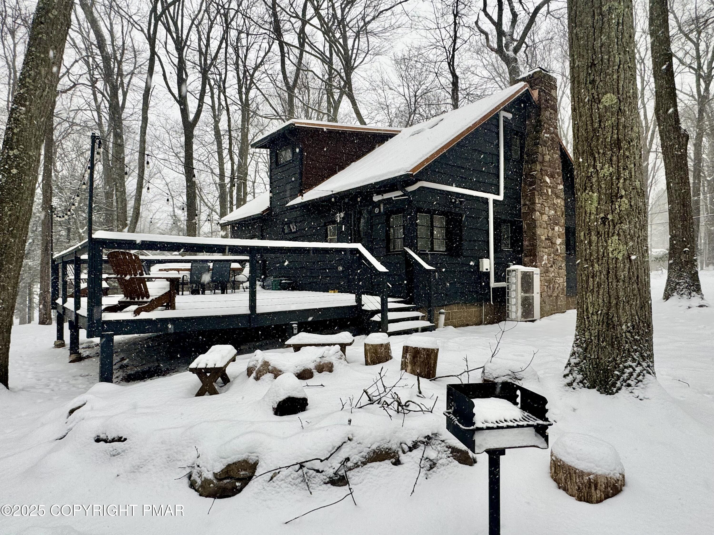 24 Split Rock Road Lake Harmony, PA 18624 - Photo 2 of 42 a view of house with outdoor seating