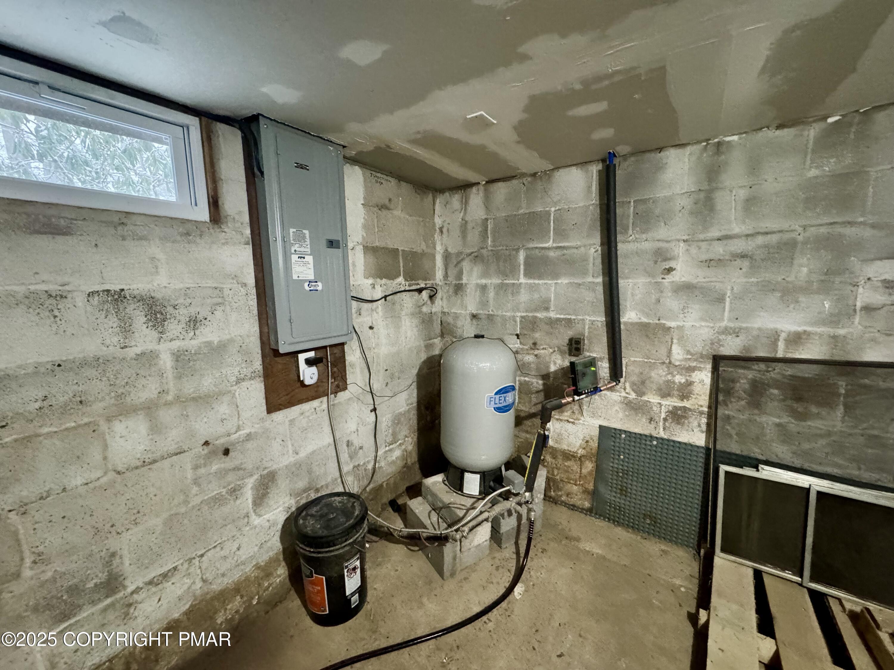 24 Split Rock Road Lake Harmony, PA 18624 - Photo 22 of 42 a bathroom with a sink mirror and window